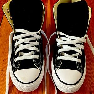 Black high top chuck tailors